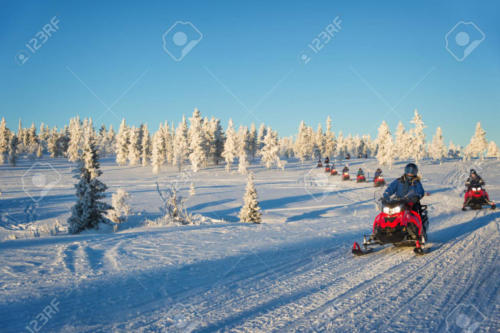 Group of snowmobiles in Lapland, near Saariselka, Finland